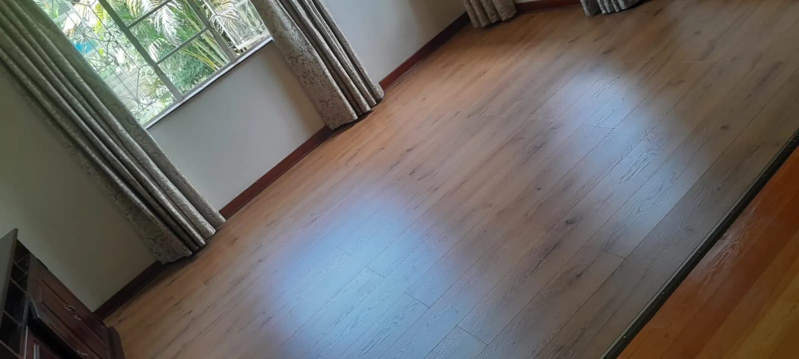 Vinyl flooring installed in a room in a Howick home